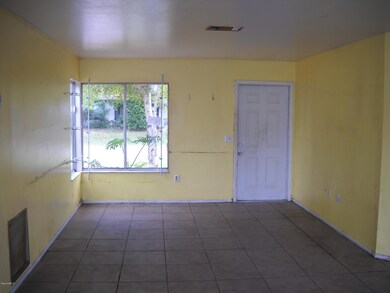 Living room view with tile flooring