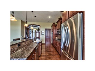 Kitchen. UPGRADED APPLIANCES AND POCKET DOOR TO WA