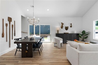 Dining area with light Representative of home bein