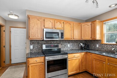 Kitchen with tile backsplash