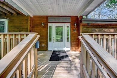 The covered front porch is 11.3 x 6.11 and feature