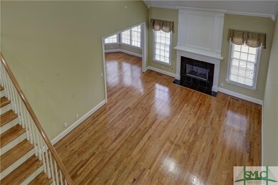 View of the living room from the second floor open