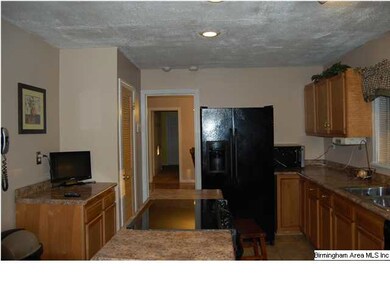 Kitchen with island,pantry and recessed lighting