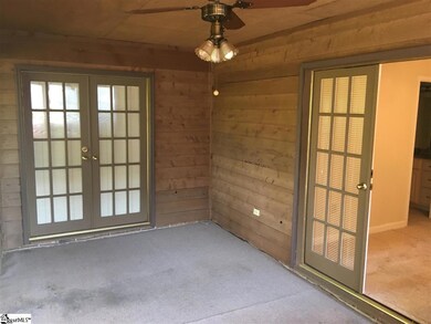 Back porch / patio has been enclosed into a Florid
