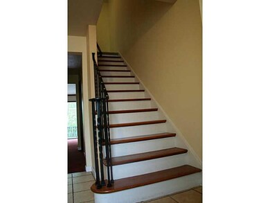 Entry/Foyer. Ceramic tile entry and hardwood stair