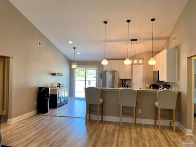 Also, 2 beds/1 bath to left. Primary bed to right