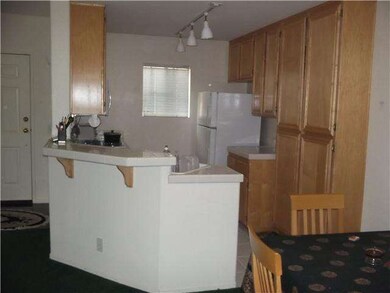 Kitchen area is open to living room so one can enj