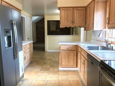 Large pantry is beside the refrigerator. Plenty of