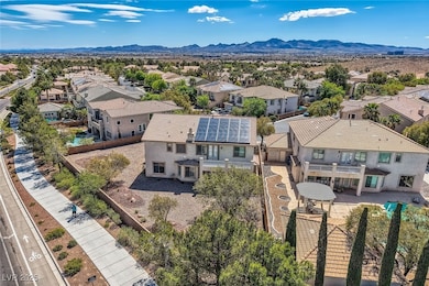 Aerial view of residential area featuring a mounta