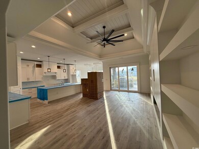 Kitchen with light hardwood / wood-style flooring,