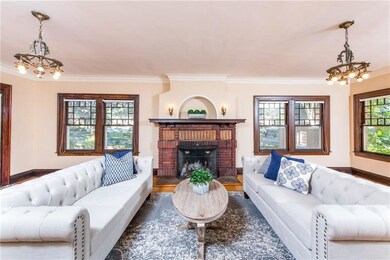 Large formal living room with lots of windows, ori