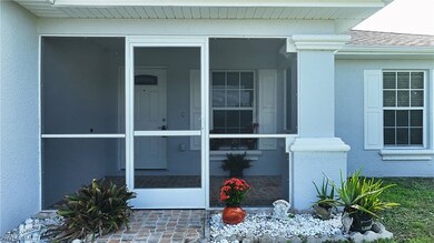 Front screened porch with beautiful tile floor.