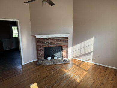 The living room does have a fireplace that is currently sealed because if was a rental.  The seal can be removed for use as a working fireplace.