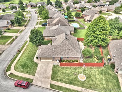 Side entry garage and close to half an acre lot.
