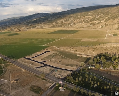 View of property location featuring mountains and rural landscape