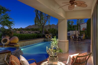 MASTER PATIO TO POOL AND MOUNTAINS NIGHT