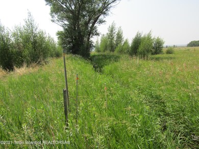 4 South corner pin is south of ditch