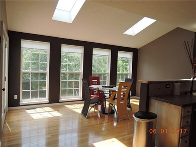 Morning room overlooking wooded lot