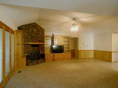 Living Room. Vaulted ceilings, flowing floor plan, dual heat system