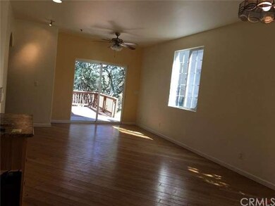 Bamboo flooring and slider to the rear deck. A ful
