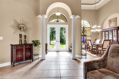 Entry and formal dining room from living room