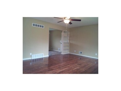Living room is open to the dining area.