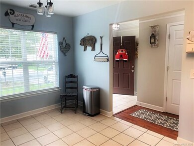 View from Kitchen to Entry and a Breakfast Table A
