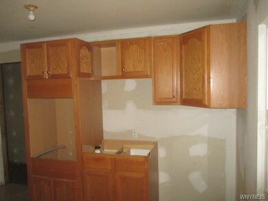 UTILITY ROOM WITH LOTS OF CABINETS