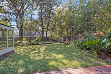 Pretty backyard that can be viewed from the sunroo