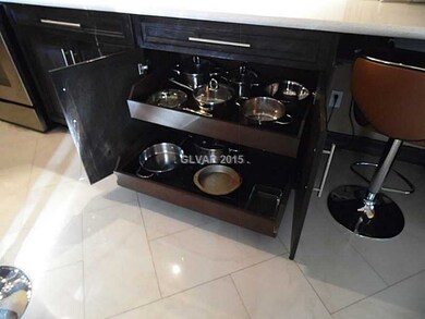 Property Photo. Cabinets also have pull out shelve