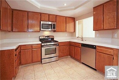 Spacious kitchen with new stainless steel applianc