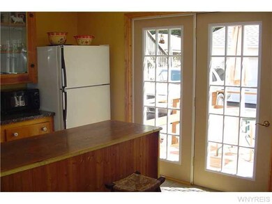 Kitchen Door to deck, yard and garage