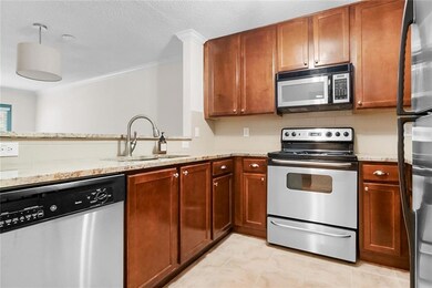 As you walk in the upgraded kitchen is to the right with stainless steel appliance and nice granite.
