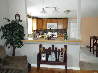 LIVING ROOM INTO KITCHEN