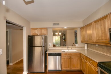 Stainless steel appliances go nicely with the mapl