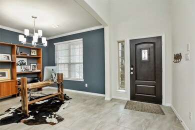 To the right of the entry, is the formal dining room or study.