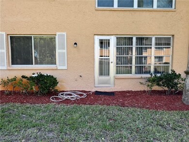 Doorway to property with stucco siding