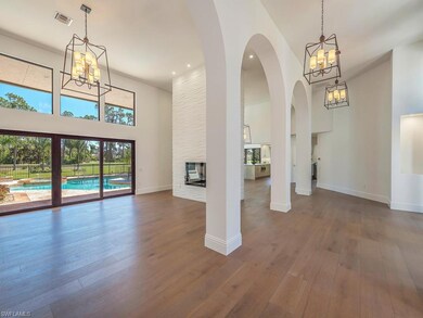 Soaring Ceilings in the Living Room Complemented b
