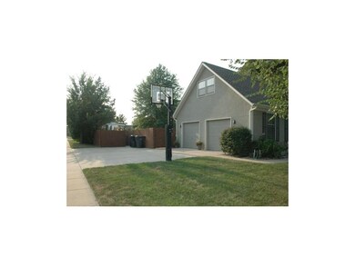 Side Entry Garage with Extra Parking Pad & Screene