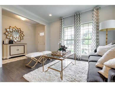 View towards the foyer from open formal living/din