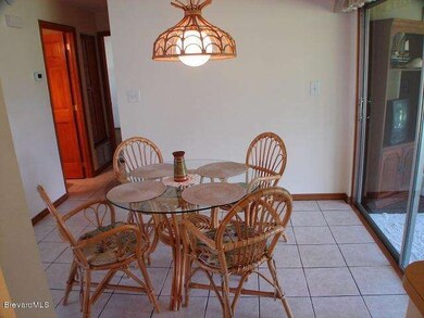 Dining Area with Sliders to Truss Porch