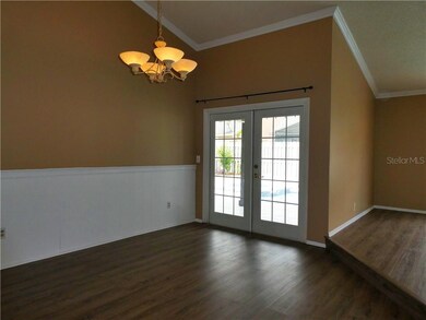 Dining Room with new wood floors and French Doors 