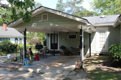 Carport on back of home