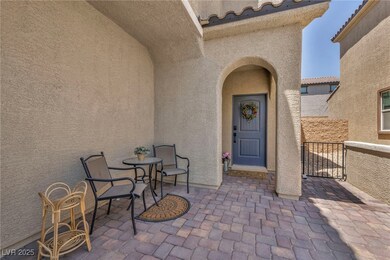 Doorway to property featuring stucco siding and a