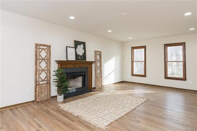 Another view of family room showcasing the floors 