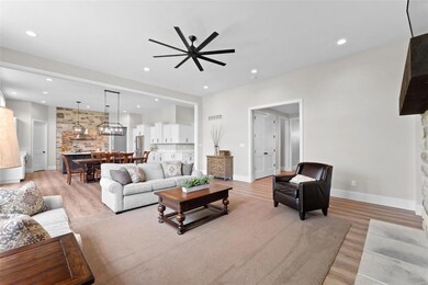 Wide plank luxury vinyl plank floors flow througho