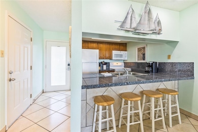 From the front entry you immediately see the kitch
