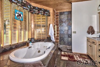 master bath with walk in shower with slate tile, J