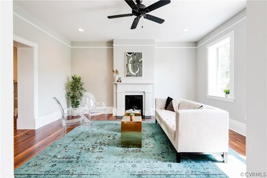 Bright and spacious living room with heart of pine