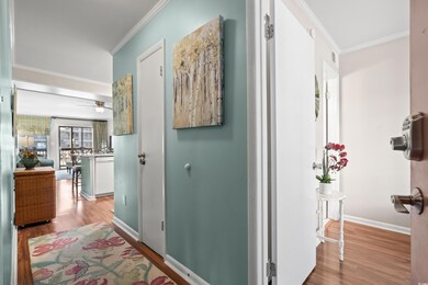 Hall featuring light hardwood / wood-style floorin